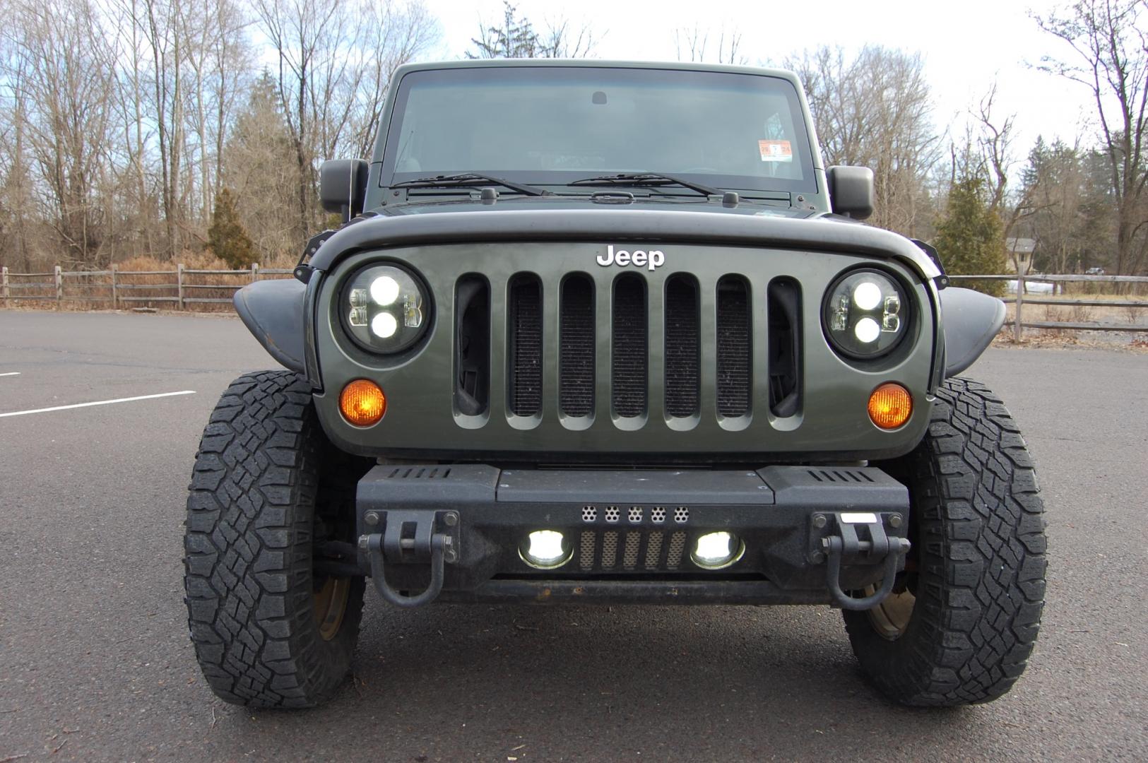 2011 Green /Tan leather Jeep Wrangler Sahara 4WD (1J4AA5D10BL) with an 3.8L V6 OHV 12V engine, 6 Speed Manual transmission, located at 6528 Lower York Road, New Hope, PA, 18938, (215) 862-9555, 40.358707, -74.977882 - Here we have a nice running and driving Jeep Wrangler with a 3.8L V6 putting power to a 4x4 manual transmission. Options include Tan leather, AC, heat, heated front seats, power windows/locks/mirrors, AM/FM/SAT/DISC/AUX radio, cruise control, tilt steering wheel, auto headlights, 3 piece removable h - Photo#6